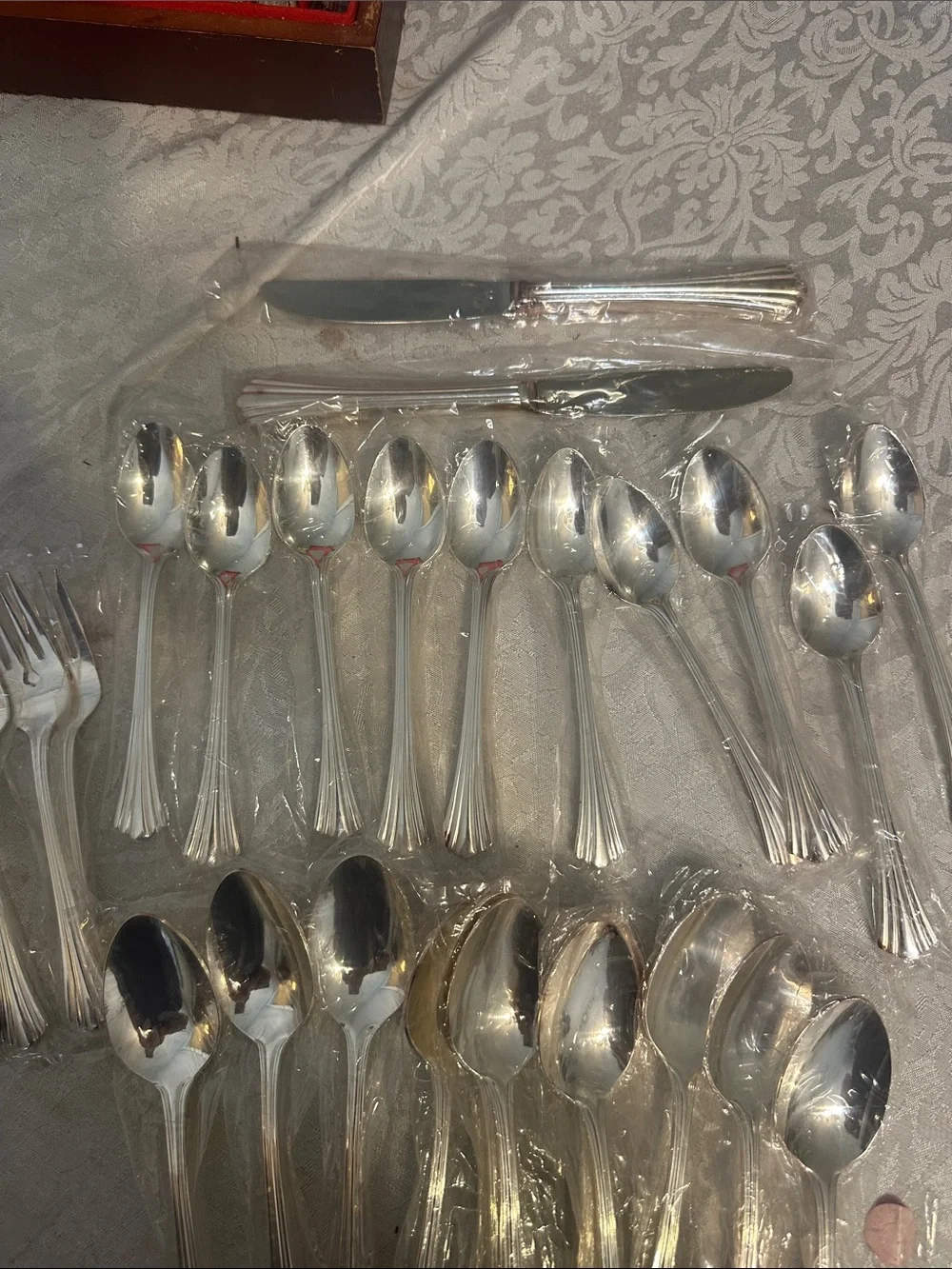 Classic Silver-Plated Flatware Set in Red Velvet Case. Used and factory sealed.